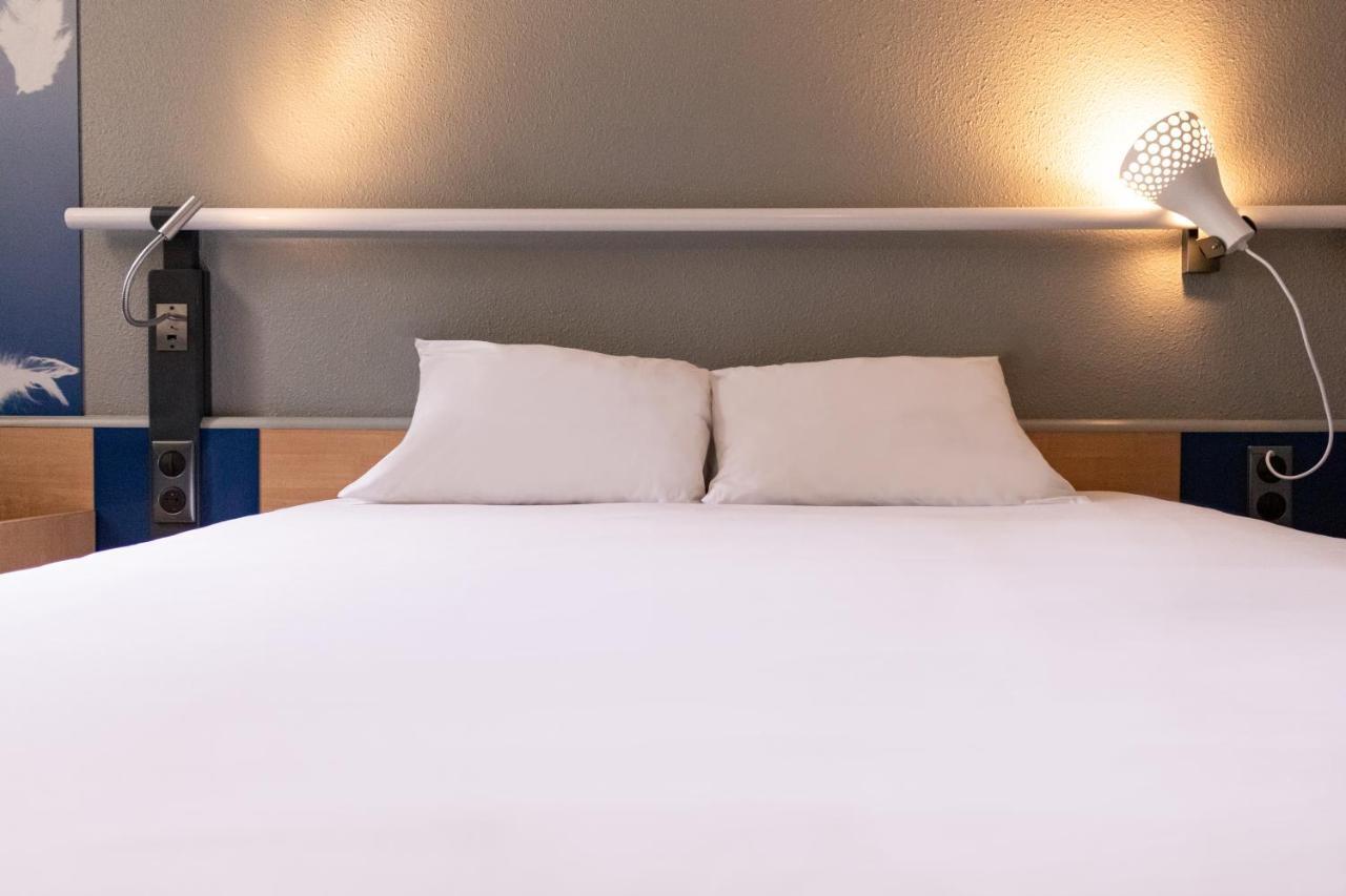 Отель Ibis Paris Женвилье Экстерьер фото